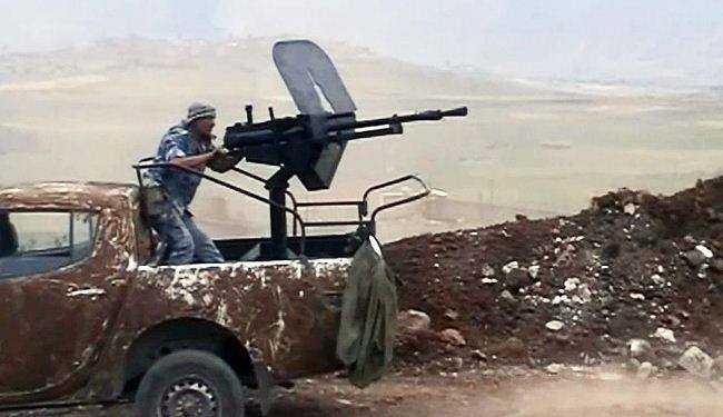 اشتباكات عنيفة بين فصائل المعارضة وقوات النظام قرب قلعة المضيق بحماة