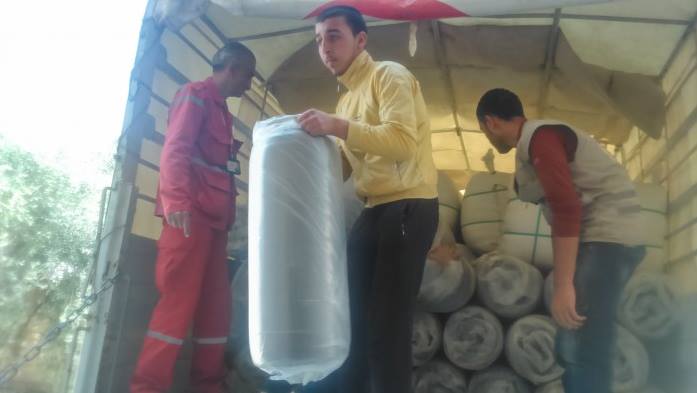 منظمات خيرية توزع مساعدات غذائية على 500 عائلة في درعا