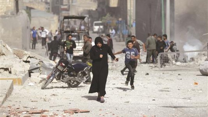 قصف بالبراميل والمدفعية الثقيلة على الغوطة الغربية.. ومعارك مستمرة