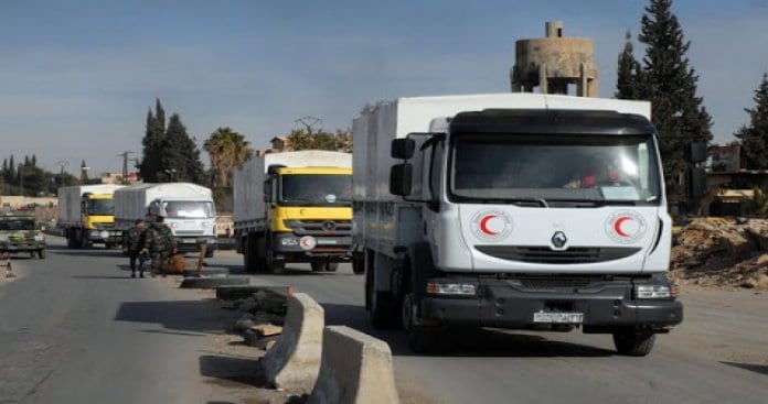 الهلال الأحمر يدخل 16 حافلة تحمل المساعدات إلى درعا