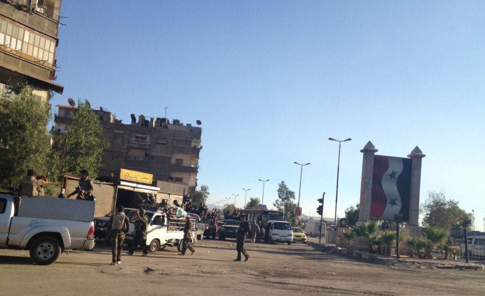 قوات النظام تسوق عناصر التسويات من الغوطة الغربية إلى درعا