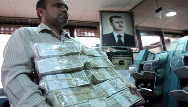 الأسد يصدر قانونا يعفي فيه المتعاملين مع المصرف الزراعي من غرامات التأخير المترتبة عليهم