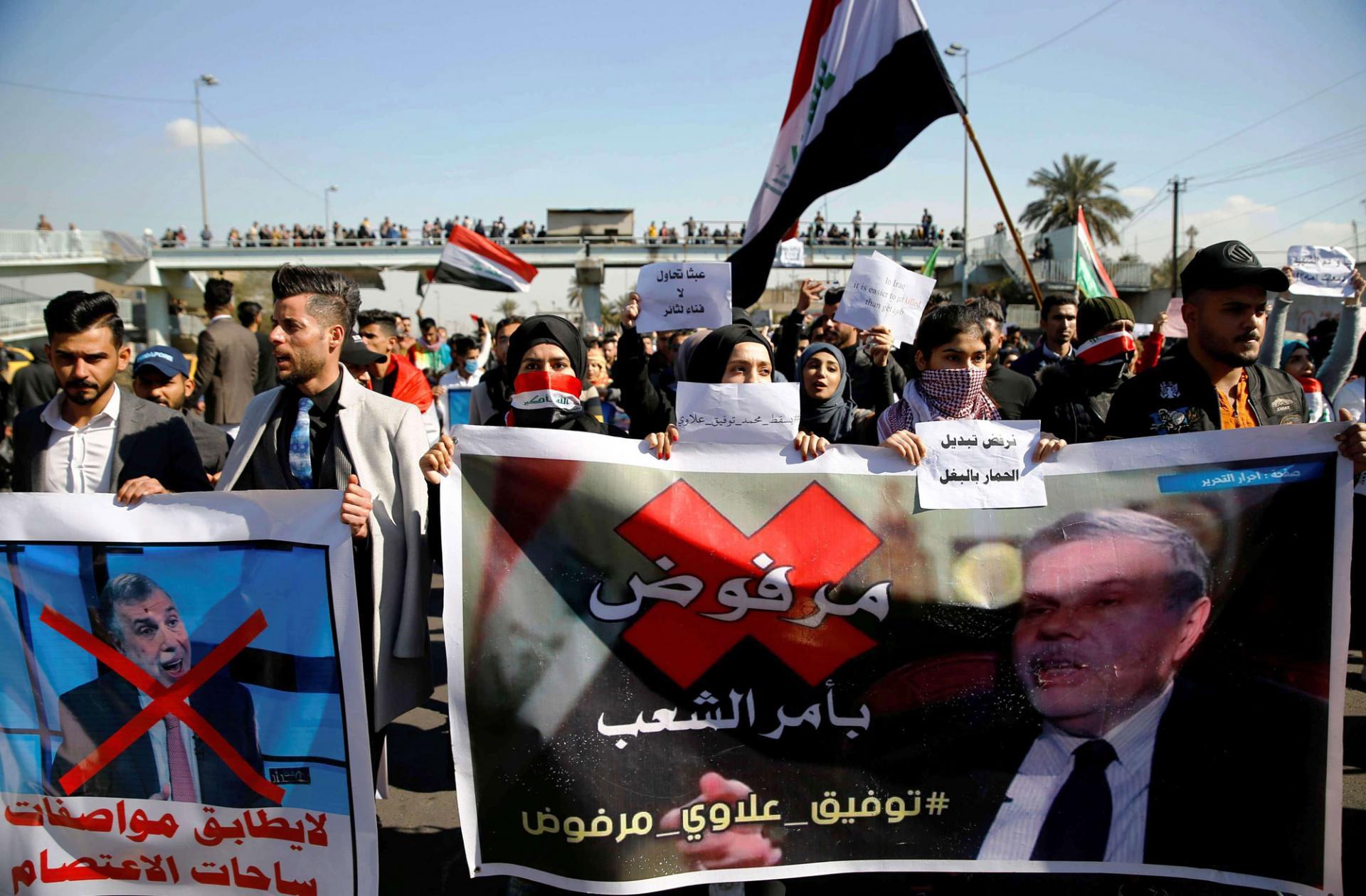 جلسةٌ برلمانيةٌ لتمريرِ الحكومة العراقية الجديدة.. والمتظاهرون: يسقط علاوي