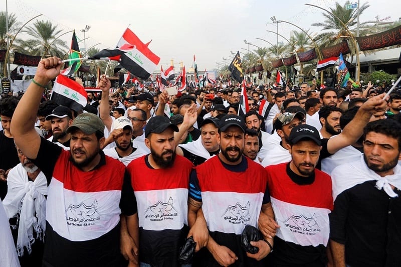 متظاهرو الناصرية ينتقلون إلى كربلاء.. و”الفتح” يدعو إلى «تنظيف» الاحتجاجات