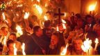 لأول مرة من فلسطين إلى الموصل.. مسيحيون عراقيون يستقبلون “النار المقدسة”