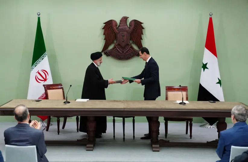توقيع الاتفاقيات بين الرئيس السوري بشار الأسد ونظيره الإيراني إبراهيم رئيسي - إنترنت