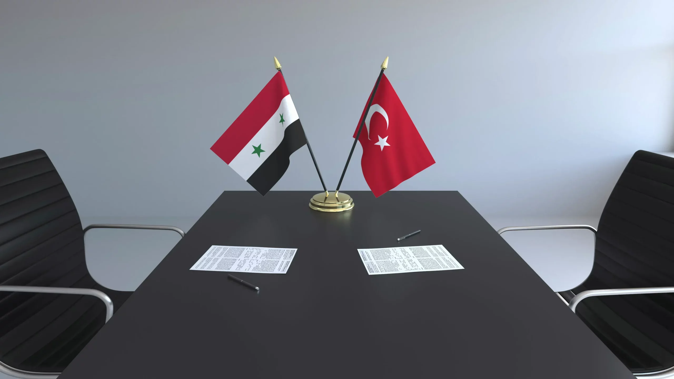 صورة تعبيرية لطاولة المفاوضات بين سوريا وتركيا - إنترنت