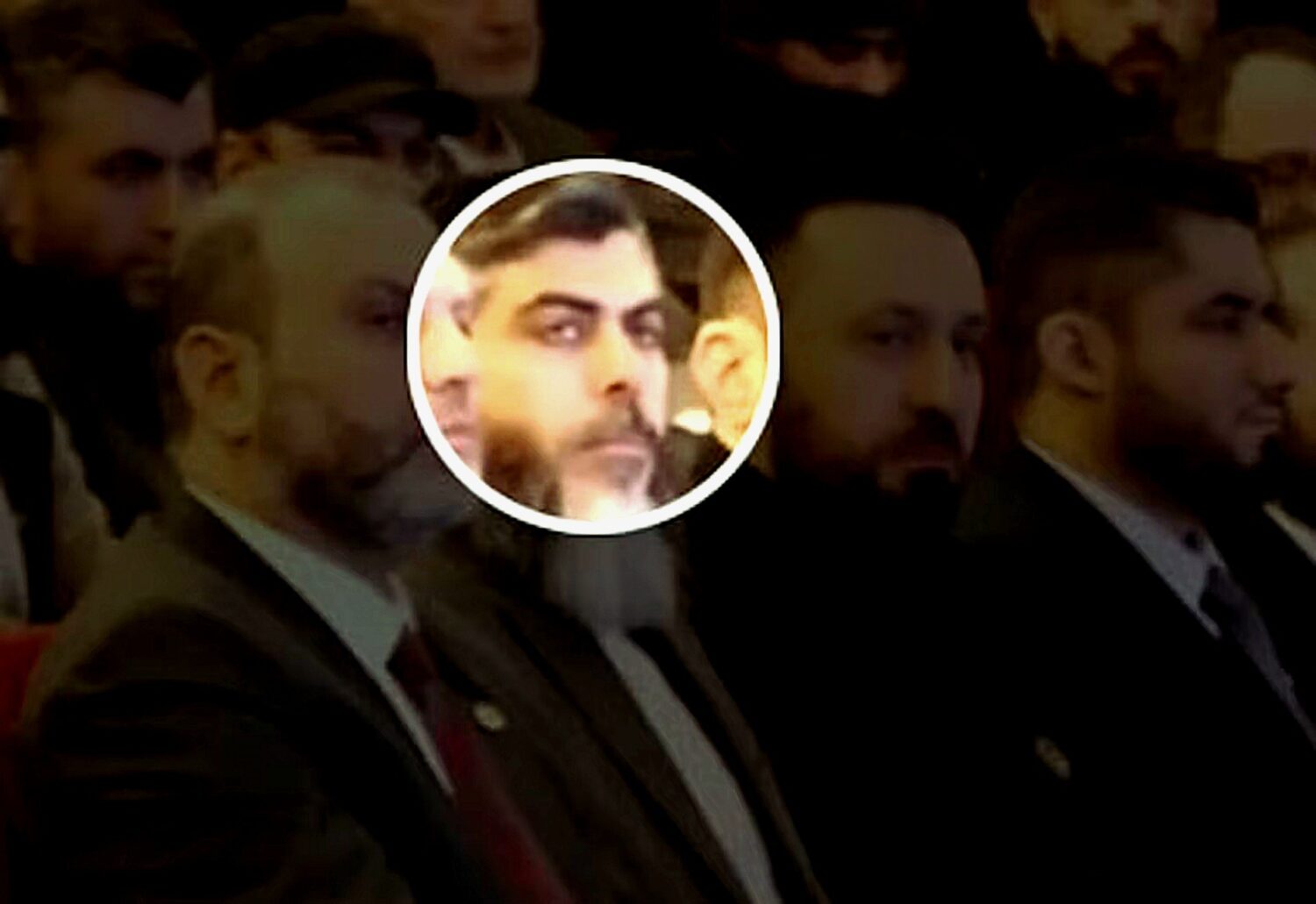 يظهر أبو عبد الرحمن، المظلل، في صورة نُشرت على حساب تابع لهيئة تحرير الشام على مواقع التواصل الاجتماعي. وهو عضو اللجنة المشرفة على الشؤون المالية للحكومة الجديدة، وفقًا لمصادر لرويترز.