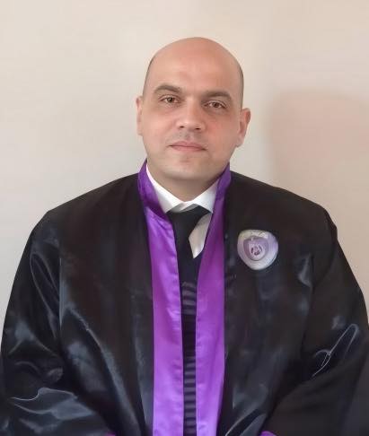 الدكتور علي اللحام - عميد كلية الآداب في جامعة دمشق