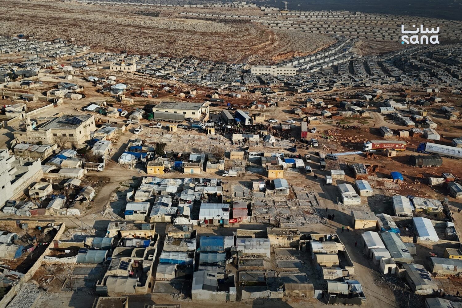 صورة جوية لأحد مخيمات إدلب - وكالة سانا